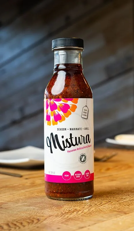 A 12 oz. bottle of Mistura Peruvian Secret Sauce